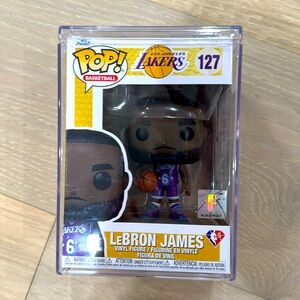 This is a Funko Pop! Vinyl figure of LeBron James (#127